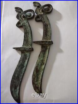 Pair of Antique Chinese Bronze Single-edged 9x2in Daggers with Patterned Handles